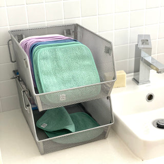 Bathroom hand towel alternative. Use one, pop in bottom basket and wash when full. This eliminates cross contamination caused by using the same hand towel by Here and After